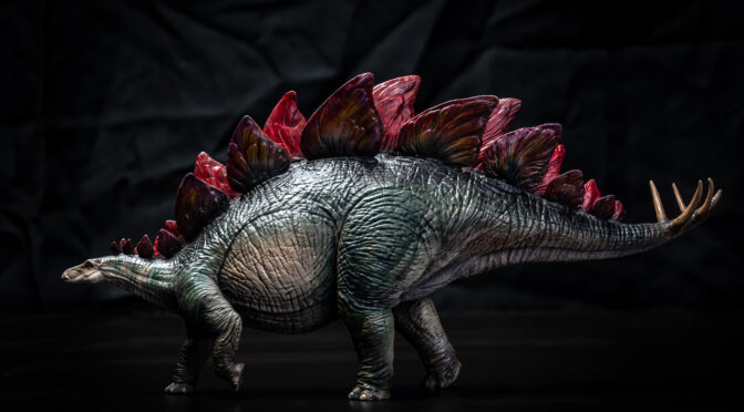 dinosaur dossier header image stegosaurus in the dark